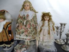 Two modern porcelain headed collector's dolls