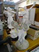 Pair of vintage metallic figurines on bases A/F and a stone boy and girl statue