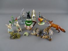 Quantity of collectable animal ornaments including a Szeilar dog, Wade tortoises, Beswick fox etc