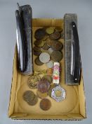 Two boxed cut-throat razors, a collection of vintage coins, two medallions, a Welsh Guards pendant