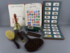 Mixed box of collectables to include a part filled cigarette card album, a small quantity of vintage
