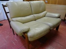 Light brown leather effect G-Plan two seater couch