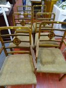 Set of six (four plus two) upholstered chairs with central octagonal design