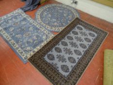 Circular Murat rug by Mastercraft rugs, an oblong rug and a Bagdad rug