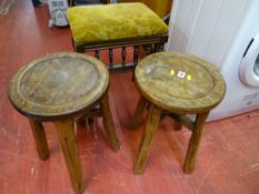 Two circular topped wooden stools and an upholstered square stool with spindle supports