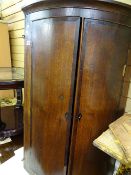 Two door corner cabinet with interior shelf