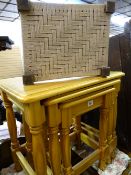 Pine nest of three tables and a string topped stool
