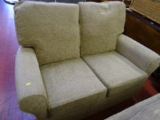 Compact two seater reversible cushion couch with woven texture upholstery