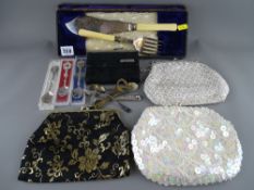 Parcel containing cased carving set, lady's purses, souvenir spoons, bottle openers etc