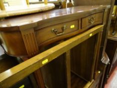 Two drawer shaped and curved hall table and a two tier polished wood trolley