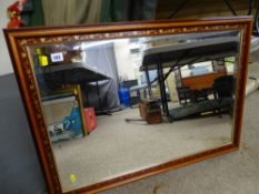 Modern bevelled glass wall mirror with inlaid surround