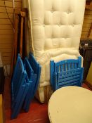 Circular painted low coffee table, three blue painted garden recliner chairs, three pine