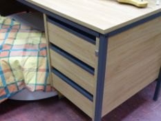 Pair of light wood office desks and a small three drawer cabinet