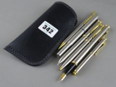 Quantity of good pens in a case including Parker