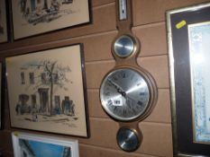 Modern balloon barometer labelled Ames, South Africa