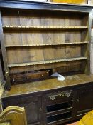 Dresser base with two cupboards and three drawers and a non-matching three shelf top
