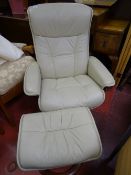 Cream leather effect easy chair and footstool