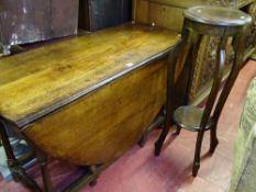 Twin flap gate leg table and a polished wood two tier plant stand