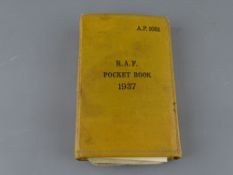 RAF pocket book dated 1937 and a quantity of ID cards