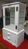A good vintage white painted metal & wooden counter top cabinet made by The Surgical Manufacturing
