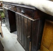 A large stained pine clerks desk