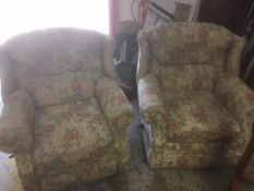 A pair of Lazy Boy-style reclining floral upholstered armchairs