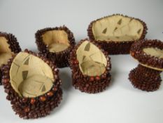 A parcel of 'Coffee Bean' dolls house furniture with two sofas, four chairs, circular occasional