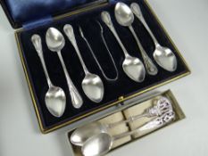Boxed set of hallmarked silver Birmingham 1910 teaspoons with sugar nips, two silver spoons