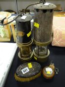 Two miners lamps, hallmarked silver hairbrush & a miners watch case