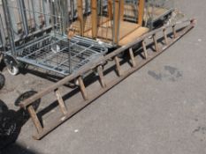 A vintage wooden window cleaner's ladder (outside)