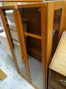 A modern teak wood two glass door display cabinet
