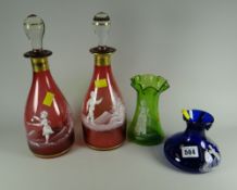 A pair of Mary Gregory decorated ruby red decanters together with two other pieces