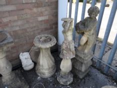 A collection of composite stone garden ornaments (outside)