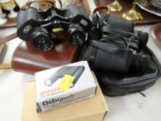 Three sets of binoculars & a camera