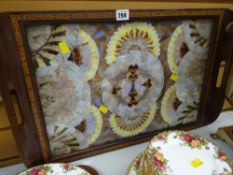 A vintage mahogany & butterfly wing decorated tea tray