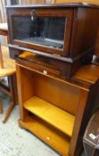 A reproduction yew small bookcase together with a reproduction mahogany hifi cabinet including DVD