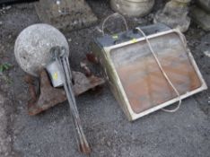 A large stone sphere floodlight & a railway sleeper clamp together with crazy golf pins (outside)