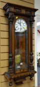 An early twentieth century mahogany & walnut Vienna wall clock