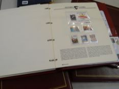 Five volumes of the Olympic Masterfile stamp collection