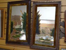 Pair of mahogany framed over painted wall mirrors decorated with swans