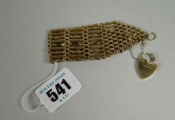A 9ct gold ladies gate bracelet together with a locket clasp, approx. 19grms