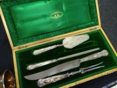 A cased hallmarked handled meat carving set together with an EPNS cake slice