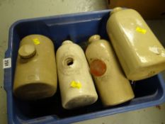A box of vintage stone bottles etc