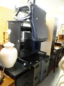 A parcel of mainly black ash office furniture including two desks, office chair, bookcase, two