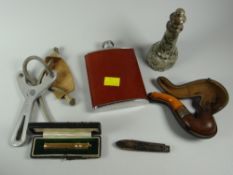 Parcel of collectables including a pipe, yellow metal pencil holder, vintage sling etc