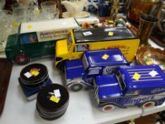 A selection of modern metal advertising biscuit tins & tin coasters