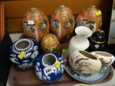 A tray of various Oriental decorated china including blue & white ginger jars, painted egg shaped