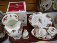 A tray of Royal Albert 'Old Country Roses' including vase, wall clock etc