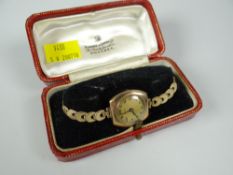 A ladies' gold wristwatch