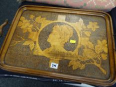 A wooden classically decorated poker work tray